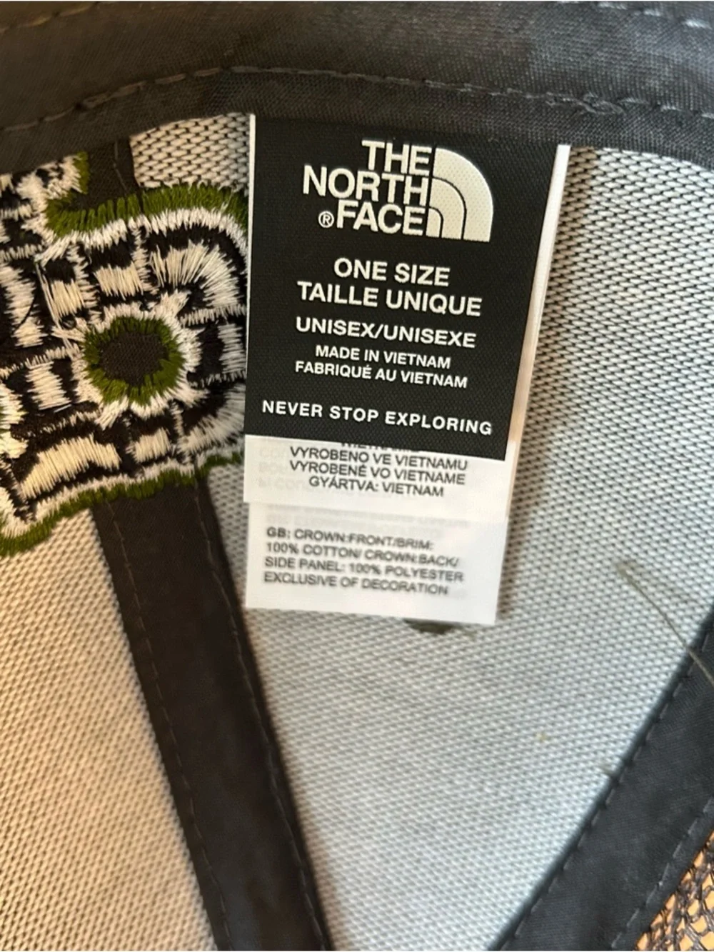The North Face green with black mesh trucker hat P on the front OSFA